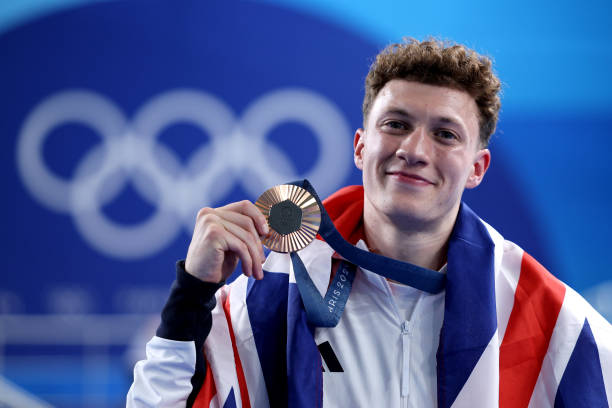 从奥运冠军到幸福人妻:伏明霞与梁锦松的相识经过